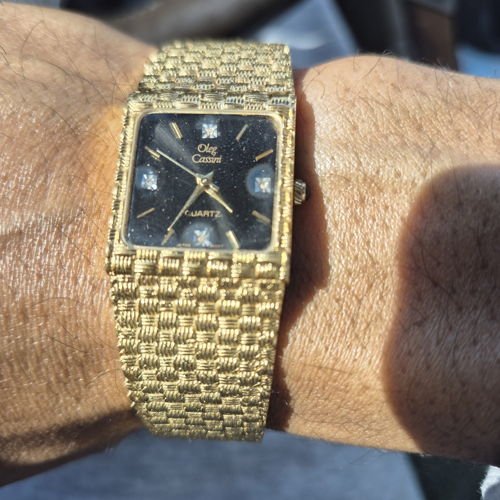 Oleg Cassini Gold and Black Luxury Watch
